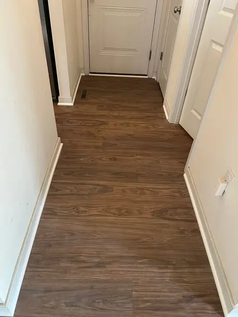 Wood-look plank flooring in a hallway