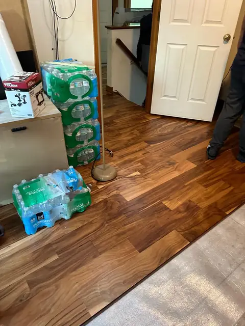 Wood flooring with natural color variation in an entryway