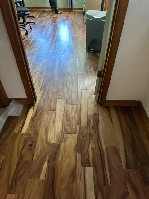 Wood flooring running through a hallway
